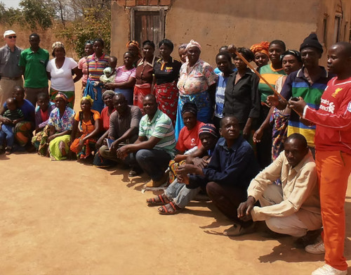 Zambian cooperatives in a circle meeting